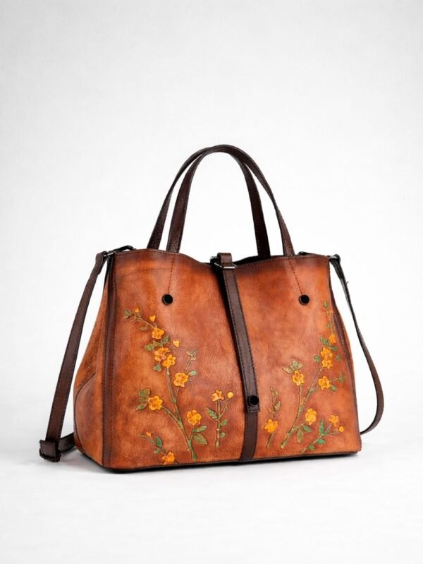 Black, brown, and beige leather handbag for women