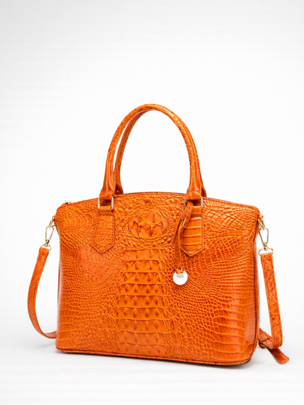 Luxury croc-embossed women’s handbag close-up detail