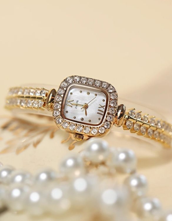 altın rengi taşlı kadın saati