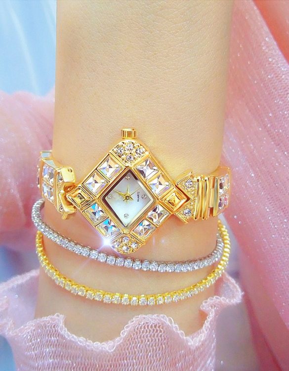 Altın Rengi Full Taşlı Kadın Kol Saati SK55317 Altın Rengi Full Taşlı Kadın Kol Saati SK55317