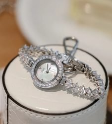 women silver wristwatch with zircon stones,