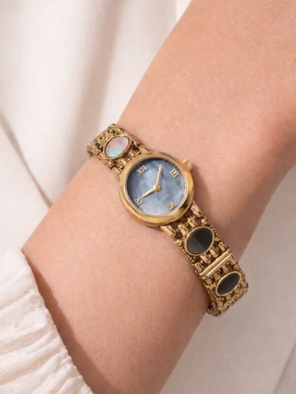 classic women watch blue stone gold finish