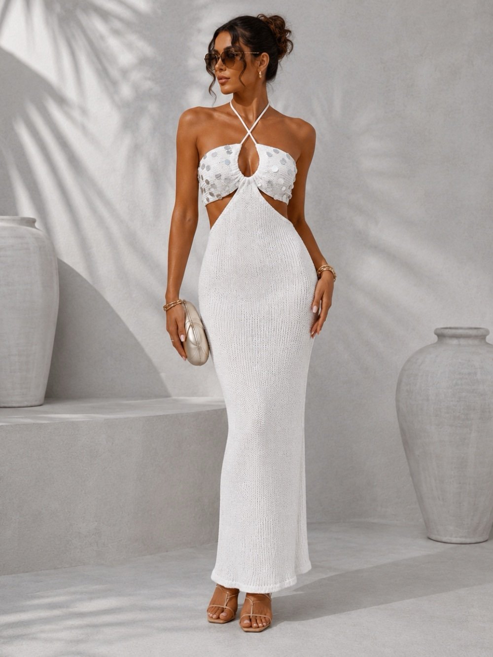 Boho chic white crochet halter maxi dress with feminine silhouette